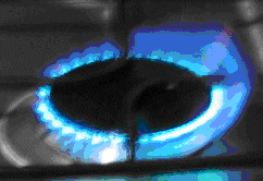 fogao com chama azul e vela com chama amarela